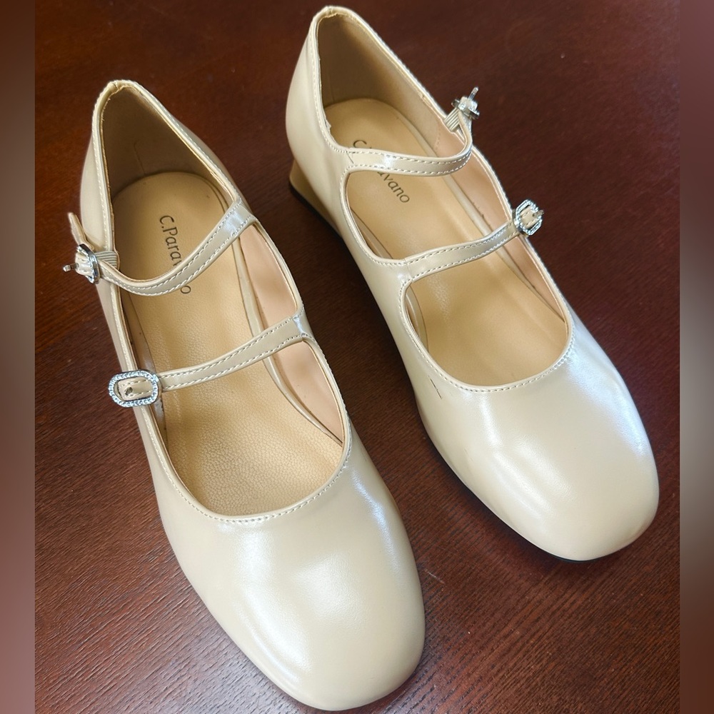C. PARAVANO HEELED SHOES
